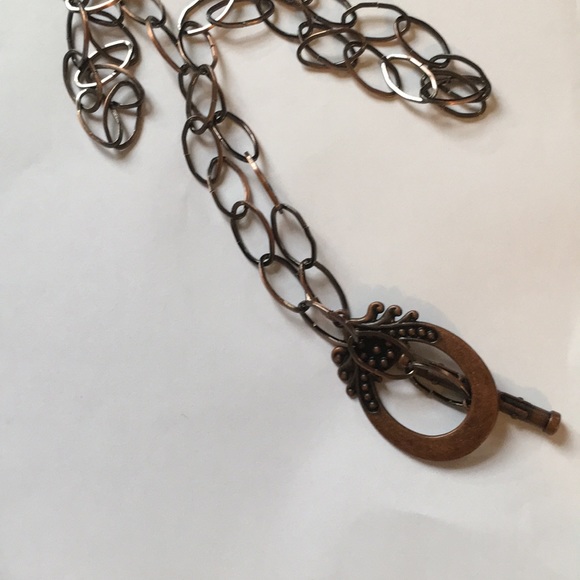Copper toned necklace.  Clasp is pendant. Stylish - Picture 8 of 9